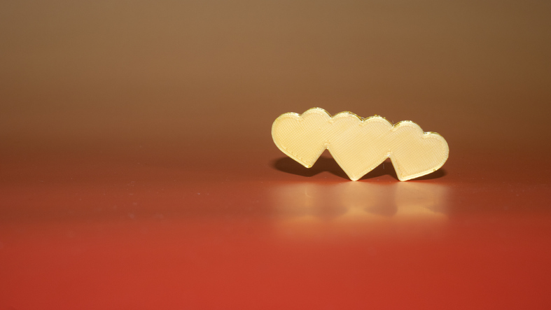 Polyamory concept, three hearts united